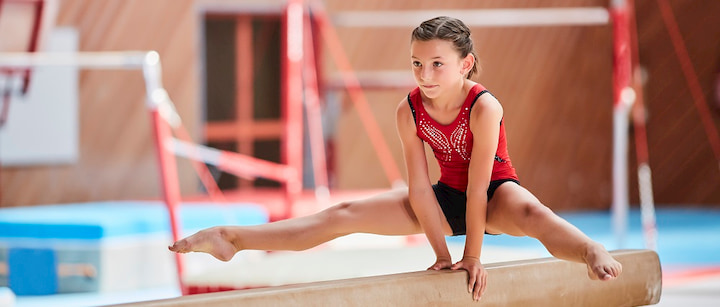 girl-training-gymnastic-in-leotard