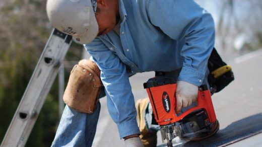 close up picture of a worker working on a roof