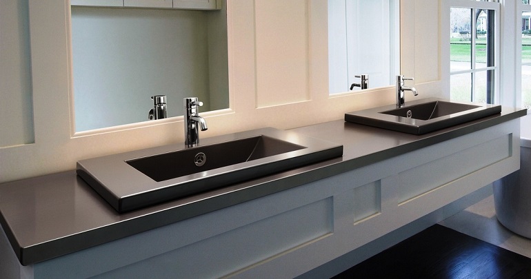 picture of modern white bathroom with dark vanity basins