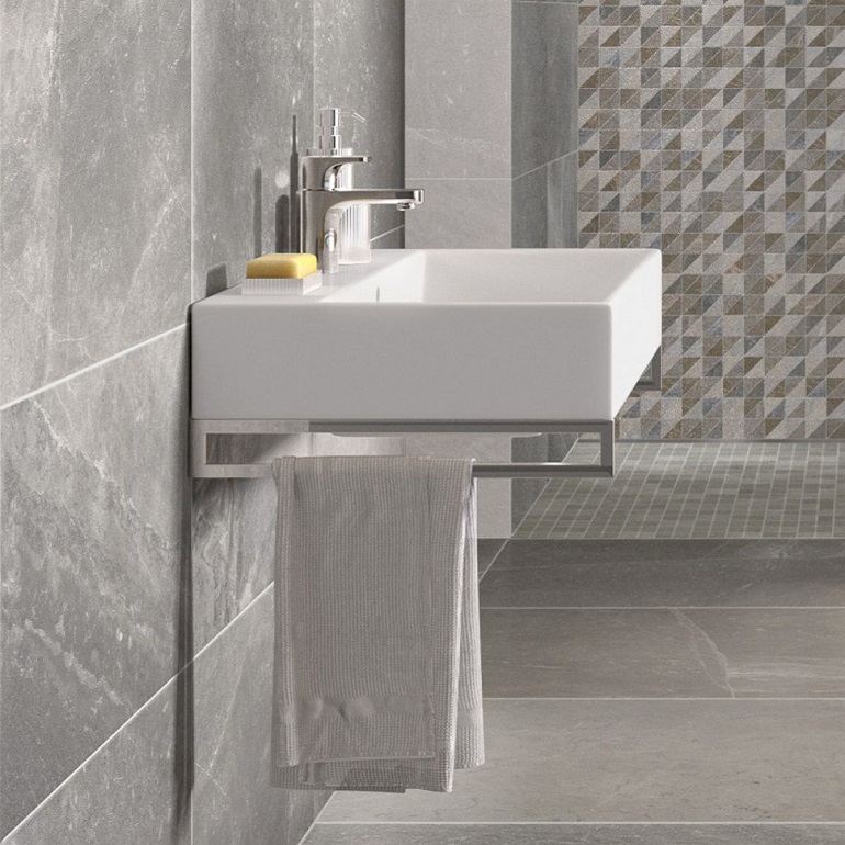 picture of a bathroom with gray tiles and a white wall hung basin