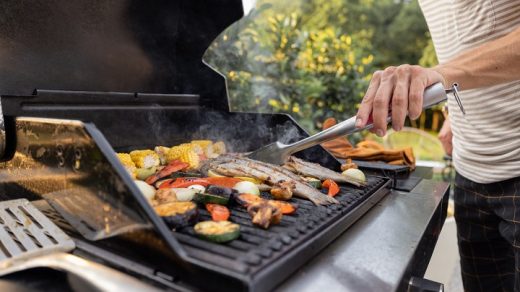 man making grill outdoors